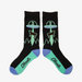 Black socks with alien abduction design in mint and light blue.